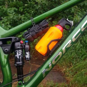 Bear spray holder for bottle cage